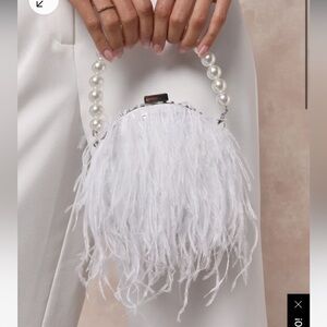 Lulus Pearl and feather purse